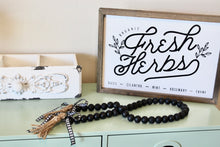 Load image into Gallery viewer, farmhouse wood bead garland in black with buffalo check ribbon and tassels