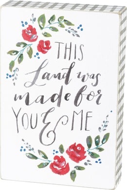 This land was made for you and me box sign