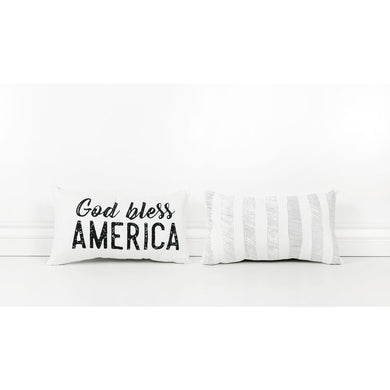 God bless America pillow in black lettering on front side and gray stripes on back